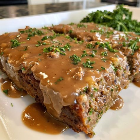 Meatloaf with Brown Gravy Recipe Mushroom Brown Gravy, Meatloaf With Brown Gravy, Meatloaf Gravy Recipe, Mushroom Meatloaf Recipes, Brown Gravy Meatloaf, Onion Soup Meatloaf Recipe, Brown Gravy Recipe Easy, Mashed Potatoes And Green Beans, Meatloaf With Gravy