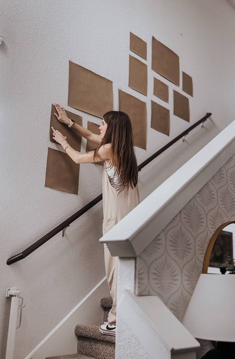 How to hang a beautiful gallery wall with family photos on your staircase Stairway Photo Wall Layout, Staircase Picture Wall, Stairway Photo Wall, Staircase Photo Wall, Photo Wall Layout, Stairway Photos, Stairway Gallery, Stairway Gallery Wall, Staircase Pictures