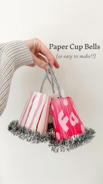 Motherhood | Mandy Roberson on Instagram: "These bells are so simple even a 2 year old can do it! It’s the perfect preschool craft. Grab paper cups from the dollar store. Decorate as you please—I used paint Grab large jingle bells and thread one through a pipe cleaner making a loop. Poke a hole in the top of the cup with scissors and thread your loop through the hole. Embellish with tinsel. Ta-da! A real working bell! #holidaycraft #kidsactivities #kidscrafts #preschoolactivities #prescho Jingle Bells Crafts Preschool, Paper Cup Bell Craft, Jingle Bell Painting, Jingle Bell Crafts, Junior Kindergarten, Craft Bells, Exhibition Ideas, Bell Art, Preschool Craft