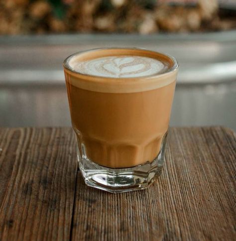 Have you walked into a coffee shop and wondered what is a cortado? And how does it compare to a latte? Here's everything you need to know. #coffee #cortado Cortado Recipe, Steamed Milk, Espresso At Home, Blue Bottle Coffee, Costa Coffee, Double Espresso, Vanilla Chai, Espresso Drinks, Frothing Milk