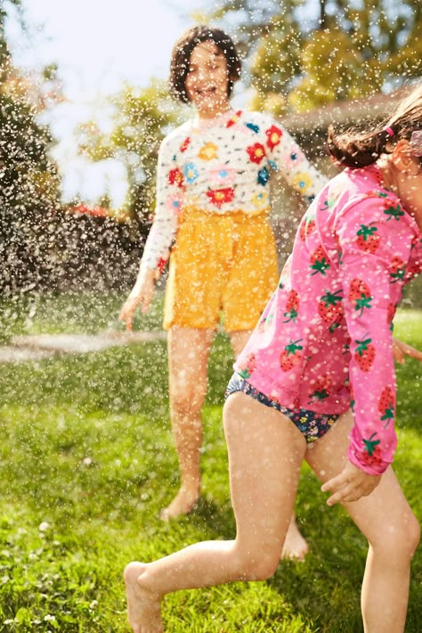 girls-playing-sprinkler-062vNsxZ4pwAIkA2L1vdK5 Backyard Water Games, Kids Sprinkler, Fun Backyard, Pool Party Kids, Splash Party, Water Games For Kids, Water Games, Party Photography, Backyard Fun