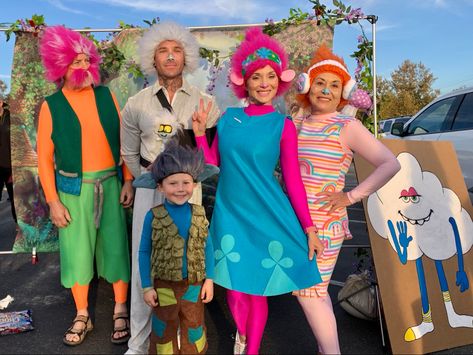 #familycostumeideas #trolls #princesspoppy #djsuki #poppy #guydiamond #branch #kingpeppy #halloween#costumeideas #kidscostumes #trunkortreat #trunkortreatideas Trolls Dress Costume Ideas, Trolls Dress Up, Branch Trolls Costume, Family Trolls Halloween Costumes, Trolls Family Halloween Costume, Trolls Costume Adult, Trolls Trunk Or Treat Ideas, Trolls Halloween Costume, Trolls Costume