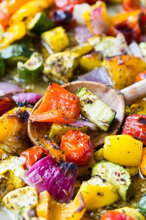 Spoon full of roasted vegetables Greek Roasted Vegetables Oven, Oven Roasted Mediterranean Vegetables, Greek Veggies Roasted, Mediterranean Vegetable Recipes, Greek Veggies, Greek Roasted Vegetables, Autumn Veggies, Mediterranean Veggies, Greek Side Dishes