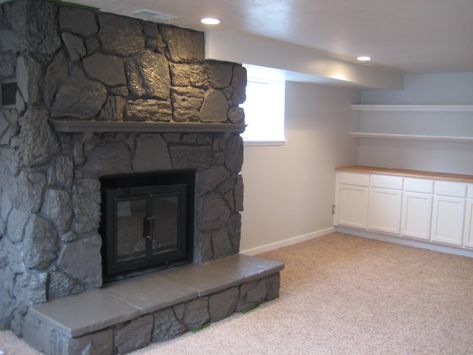 Lava Rock Fireplace Makeover, Mantels With Tv Above, Rock Fireplace Makeover, Painted Rock Fireplaces, Lava Rock Fireplace, Painted Stone Fireplace, Grey Wood Tile, Stone Fireplace Makeover, Grey Fireplace