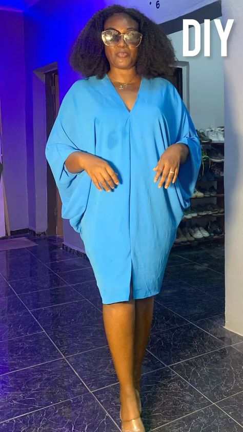 How to cut and sew short cowl bubu gown stlye Cowl Boubou Dress, Short Abaya Style, Cowl Caftan And Bubu Dresses, Short Bubu Gown Styles Silk, Plain Material Short Gown Styles, Bubu Gowns For Ladies, Style For Bubu Gown, Satin Bubu Gown Styles, Ready Made Gowns For Ladies