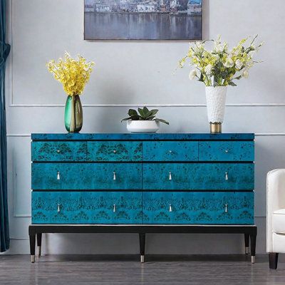 Versatile cabinet fits perfectly in both living rooms and bedrooms with eight drawers of various sizes for optimal space use and organized storage of decor and essentials. Rosdorf Park Color: Blue | Rosdorf Park Kyren 63 Sideboard Wood / Metal in Blue | 38.58" H X 63" W X 15.75" D | Wayfair Partition Entrance, Luxury Entrance, Foyer Wall, Entrance Cabinet, Deck Box Storage, Blue Furniture, Buffet Tables, Wall Living Room, Entrance Foyer