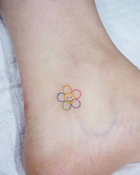 Minimalist Flower Tattoo Color, Smiley Flower Tattoo, Rainbow Flower Tattoo, Small Tattoos Smiley Face, Tiny Colorful Flower Tattoos, Tiny Tattoos Smiley Face, Tattoo Triangle, Small Colorful Tattoos, Simple Flower Tattoo