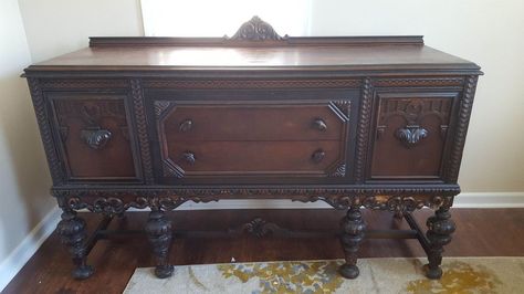 I started redoing furniture, as a hobby for my home, about 6 months ago. Little pieces, here and there... I was waiting to get my hands on a piece like this! When I got it, I couldnt contain my excitement! a Jacobean Buffet! HOW BEAUTIFUL! I started by inspecting it - cleaning it. That's usually my general rule of thumb. Inspect, clean and then repair. I had to make a few repairs to this buffet. The bottom right foot was missing a chunk so I repaired by using Bondo and build… Jacobean Furniture, Jacobean Buffet, Oak China Cabinet, Redoing Furniture, Rustoleum Chalk Paint, Greek Garden, Wood Spa, Chalk Paint Makeover, Buffet Makeover