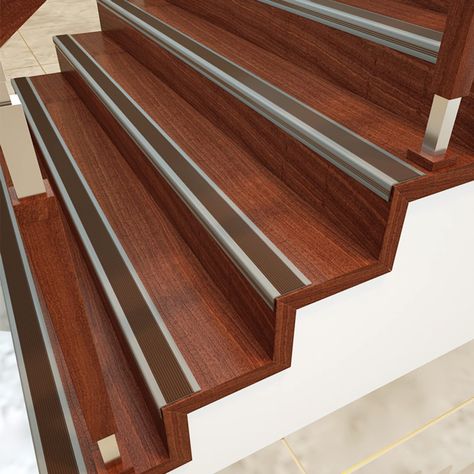 The aluminium stair nosing is an excellent way to give your staircase a new look. It can be used to create a stylish look or to add a modern touch to your staircase. The aluminium stair nosing is a great product because it is made from aluminum and it is lightweight. It is also durable and can last for a long time. It is also resistant to corrosion. Wood Staircase, Stair Nosing, Wooden Stairs, Stairs, Canning, Wood