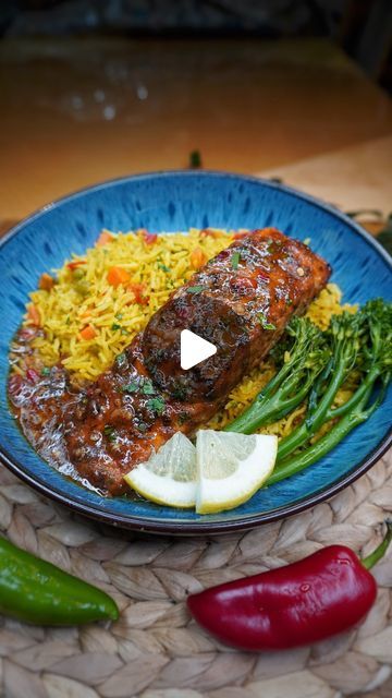 Kay on Instagram: "HOT HONEY CREOLE HERB GLAZED SALMON AND ROASTED GARLIC TURMERIC RICE 🇺🇸🍣😊🔥💃🏽💣🎉⚡️🚦🥳🏆☄️.
Super YUMMY, flaky, sweet, spicy and topped with a melt-in-your-mouth honey creole herb butter sauce that is bursting with flavour!! 
The creole herb seasoning adds boldness and boastful flavor to the dish, while the honey butter serves up a sweet dainty twist. 
Quick easy dish made in 30 minutes. 
Served with the most flavourful yellow rice.
.
.
DM FOR MORE INFO TO GET MY DAILY RECIPES. Comes with the rice recipe.
.
.
#creolesalmon #seafood #pescatarian #wow #georgia #toronto #houston #newjersey #atlanta #lasvegas #california" Garlic Turmeric Rice, Harissa Salmon, Herb Butter Sauce, Alpha Gal, Turmeric Rice, Allergy Recipes, Vegetable Rice, Romantic Meals, Yellow Rice