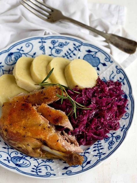 Czech-style roast duck with braised red cabbage and potato dumplings. Roasted Duck Recipes, Braised Red Cabbage, Roasted Duck, Cabbage And Potatoes, Potato Dumplings, Roast Duck, New Year's Food, Czech Recipes, Romantic Dinner Recipes