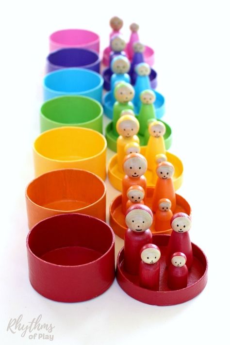 This fun rainbow craft is also a DIY Toy for kids! Wooden peg dolls like these are commonly used for pretend or imaginative play and color matching games in Montessori and Waldorf education. Click through to learn how easy it is to make these unique handmade DIY toys! A homemade gift idea for Christmas and birthdays. #RainbowCraft #PegDolls #DIYToyforKids Diy Rainbow, Homemade Toys, Doll Family, Waldorf Toys, Montessori Toddler, Wooden Pegs, Doll Crafts, Montessori Toys, Matching Games