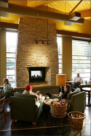 Another of my fave places: The cozy coffee shop is really well represented in this photo. I hope our local stores change to this decor soon!   Starbucks put drama in its new Mercer Island store with an indoor/ outdoor gas fireplace. Photo: Mike Urban/Seattle Post-Intelligencer / SL Storefront Inspiration, Starbucks Interior, Contemporary Sheds, Backyard Envy, Coffee House Design, Store Architecture, Starbucks Design, Indoor Outdoor Fireplaces, Green Homes