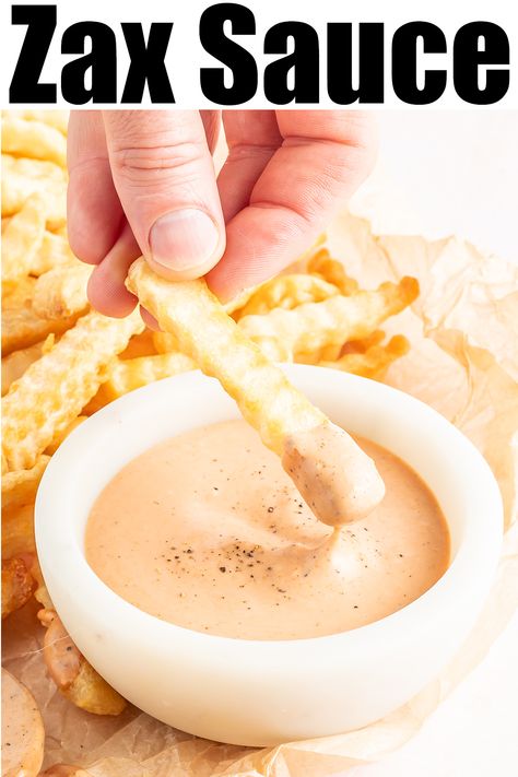 Bold text at the top reads "Zax Sauce". Underneath is a hand lifting the end of a crinkly french fry out of the creamy Zax sauce. Zax Sauce, French Fry Sauce, Sauce Ideas, Savory Dips, Comeback Sauce, Sriracha Aioli, Yum Sauce, Pimento Cheese Recipes, Fried Chicken Tenders