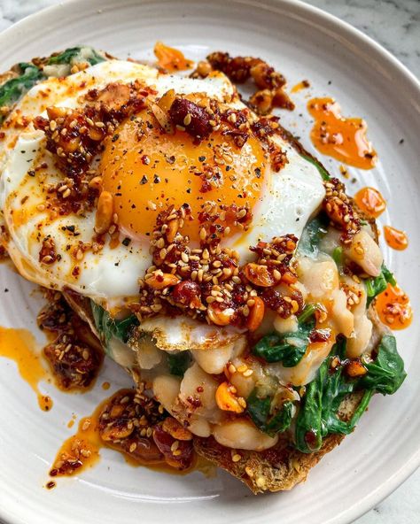 Bold Bean Co on Instagram: “BANG BANG BEANS white beans + spinach on toast with a fried egg + @whitemausu chilli peanut rayu The creamy white beans, the kick +…” White Beans On Toast, White Beans Spinach, Creamy White Beans, Breakfast Beans, Beans On Toast, High Protein Breakfast, On Toast, Cooking Inspiration, Slice Of Bread