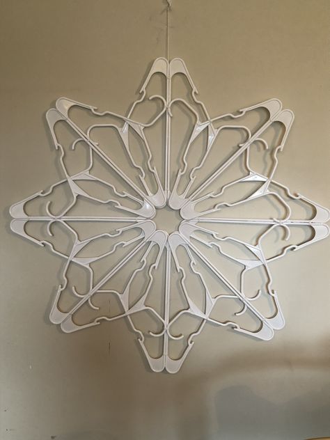 Clothes Hanger Crafts Snowflake, White Plastic Hanger Snowflakes, Clothes Hanger Snowflake Diy, Plastic Hanger Snowflake Diy, Coat Hanger Snowflake Diy, Bicycle Tattoo, Diy Coat, Dollar Store Diy Organization, Hanger Crafts