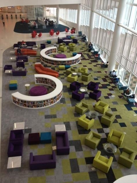 The James B. Hunt Library at North Carolina State University is a revolution in information storage. At the Hunt, robots fetch the books. Two million Meja Sofa, School Library Design, High School Library, Library Inspiration, North Carolina State University, School Interior, Library Furniture, Modern Library, Corporate Interiors