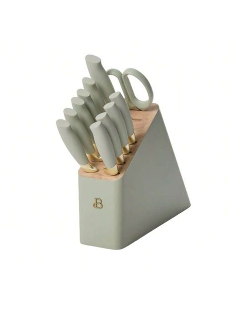 Purposeful tools create purposeful kitchen moments. The Beautiful 12 Piece Knife Block Set features a variety of knives and all-purpose shears to slice, dice, mince, cut, and more. Innovative knives and scissors feature white soft grip handles with our signature gold accents that fit comfortably in your hand. Durable stainless steel blades feature a stick resistant, resin coating that limit food from adhering to the knife and allow for easier, more efficient cutting.  Store and display in our signature knife block that will look beautiful on your kitchen counter. 12 Piece Knife Block set includes: 8-inch chef knife, 5.5- inch serrated utility knife, 5-inch Serrated Santoku knife, 3.5- inch paring knife, (6) 4.5-inch Steak Knives, All Purpose Shear, White Block. Knives and shears are hand-w