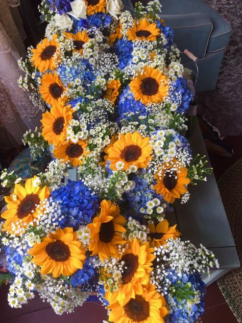 Love these bright summer bouquets featuring sunflowers, blue hydrangea and baby's' breath! Designed by Jen-Mor Florist, Dover, Delaware www.jenmor.com Blue Roses And Sunflowers Centerpiece, Sunflowers And Blue Hydrangeas, Sunflower And Blue Centerpieces, Sunflower And Blue Hydrangea Bouquet, Sunflower Hydrangea Bouquet, Blue Sunflower, Sunflower And Blue Wedding, Blue Orchid Bouquet, Blue Sunflower Wedding