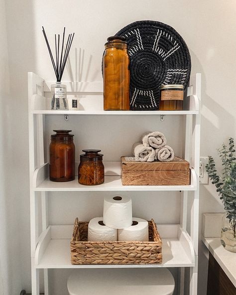 Towel Above Toilet, Over Toilet Storage Organization, Bathroom Shelf Decor Over Toilet Organization Ideas, Toiletries Storage Bathroom, Open Bathroom Shelving Decorating Ideas, Black Over Toilet Storage, Toilet Cabinet Organization, Over The Toilet Rack Decor, Bathroom Organizer Over Toilet