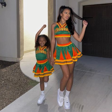 DAE BROWN on Instagram: ““Trynna steal our bit, but you look like sh*t but we’re the ones who were down with it” 🧡☘️💛 #EastComptonClovers” Clover Cheerleader Costume, Halloween Dance Party, Cheer Costumes, Clover Pattern, Halloween Dance, Cheerleader Costume, Performance Costume, Cheer Outfits, Women Halloween