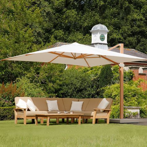 The Barlow Tyrie Napoli 13' Square Cantilever Umbrella provides portable shade to a large outdoor seating or dining area. Large Outdoor Umbrella, Large Patio Umbrellas, Cantilever Patio Umbrella, Pergola Design, Wooden Pergola, Cantilever Umbrella, Pergola Plans, Diy Pergola, Pergola Patio