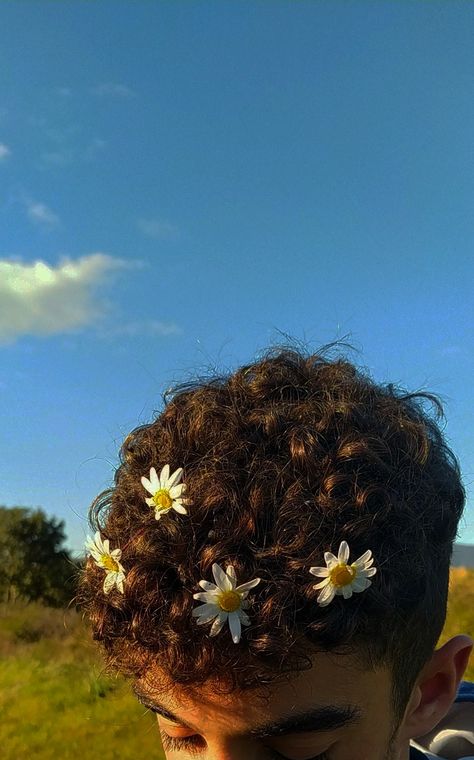 Male Curly Hair Aesthetic, Men With Flowers In Their Hair, Men Brown Curly Hair, Short Curly Hair With Flowers, Flowers In Hair Boy, Curly Hair Boyfriend Aesthetic, Curly Hair Boys Aesthetic, Curly Hair Aesthetic Boy, Dark Curly Hair Men