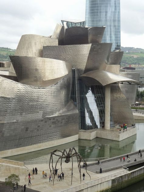 Scrumpdillyicious: Frank Gehry's Iconic Bilbao Guggenheim Museum Frank Gehry Architecture, Gehry Architecture, Guggenheim Museum Bilbao, Deconstructivism, Landmark Buildings, Frank Gehry, Fred Astaire, Guggenheim Museum, Futuristic Architecture