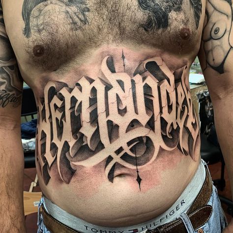 Lower Ab Tattoo For Men, Stomach Tattoos Lettering, Stomach Lettering Tattoos Men, Self Made Tattoo Lettering, Money Scripting, Chest Tattoo Fonts, Tattoo Nombres, Self Made Tattoo, Hercules Tattoo