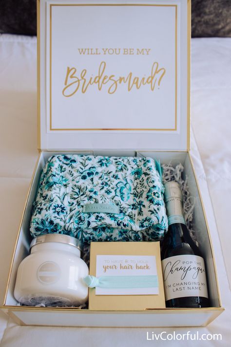 These bridesmaid proposal boxes are my FAVORITE! I had so much fun putting them together 😋 checkout my blog & youtube channel for a more in-depth tour of my boxes! Best Bridesmaid Proposal Ideas, Bridesmaid Proposal Items, Fun Bridesmaid Proposal, Green Bridesmaid Proposal Box Ideas, Coastal Bridesmaid Proposal, Bridesmaid Proposal Box Ideas Destination Wedding, Bridesmaid Box Destination Wedding, Blue Bridesmaid Proposal Box Ideas, Bridesmaid Proposal Blue And White