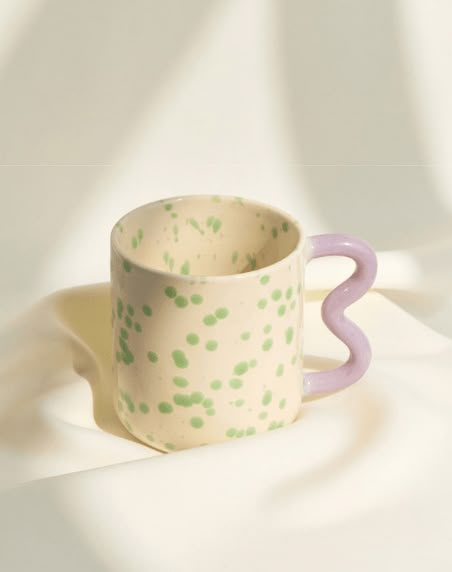 Our Speckled Wavy Ceramic Mugs have been designed with enjoyment in mind - perfectly proportioned and handmade with care. In addition to morning coffees, we love to use this vessel for everything from juices to desserts to gin & tonics. All ceramics are handmade in our studio. Slight irregularities in size, glaze and texture reflect the artisan nature of the product and should be embraced. Product Details: Delicately handmade Capacity: 330ml Heat-resistant, microwave and dishwasher friendly; Non Diy Keramik, Ceramics Pottery Mugs, Diy Pottery Painting, Mug Crafts, Cerámica Ideas, Pottery Workshop, Diy Ceramic, Keramik Design, Ceramics Ideas