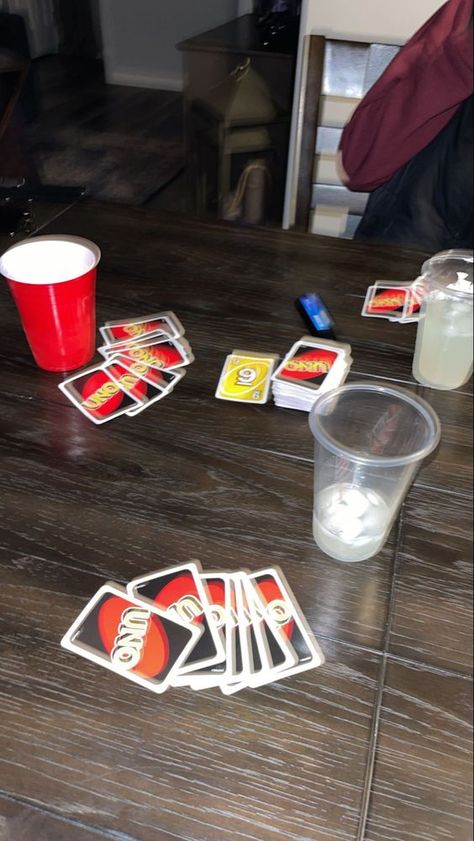 A fun game of Uno at a party with friends Game Night Photography, Board Games With Friends Aesthetic, Friends Playing Games Aesthetic, Playing Uno Aesthetic, Uno Game Aesthetic, Family Night Aesthetic, Family Game Night Aesthetic, Uno Game Night, Board Game Night Aesthetic