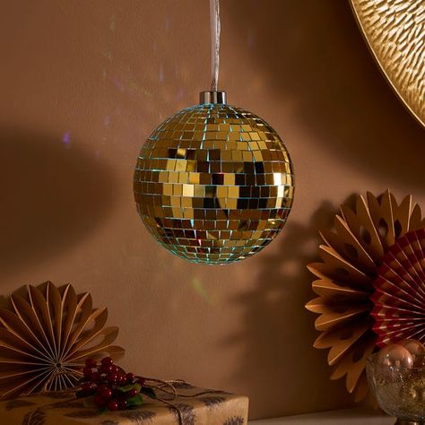 * Eye-Catching Disco Ball Design * Striking Gold Colourway * Colour-Changing Function * Requires 2 x AA Batteries (Not Included) Make a statement with the Light Up Disco Ball Hanging Decoration in a striking gold colourway. This eye-catching piece features a colour-changing function and is conveniently battery operated. Disco Ball Hanging, Disco Ball Design, Plastic Lights, Ball Design, Disco Balls, Colour Changing, Batteries Not Included, Box Ideas, Aa Batteries