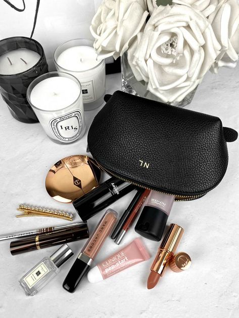 My on-the-go makeup bag essentials #makeup #beauty #makeupbag / Instagram: @fromluxewithlove Minimalist Makeup Bag, Minimal Makeup Routine, Clinique Perfume, Marc Jacobs Lipstick, Whats In My Makeup Bag, Senior Thesis, Flatlay Makeup, Makeup Bag Essentials, Minimalist Makeup