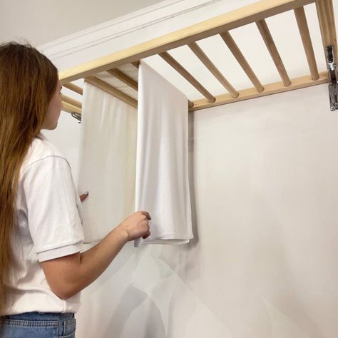 Our Wall Mounted Clothes Drying Rack offers a practical and efficient solution for drying laundry. Crafted from high-quality wood, this foldable design saves space while adding a touch of style to your home. Efficient and Space-Saving: Save money and floor space with our innovative drying rack. Hang wet clothes over the laths and raise them near the ceiling using the pulley system for quick and efficient drying. Customizable and Stylish: Tailor-made to fit your space, our drying rack comes in va Wall Mounted Clothes Drying Rack, Drying Laundry, Hanging Drying Rack, Wall Mounted Drying Rack, Hidden Laundry, Laundry Rack, Pulley System, Drying Rack Laundry, Wall Mount Rack