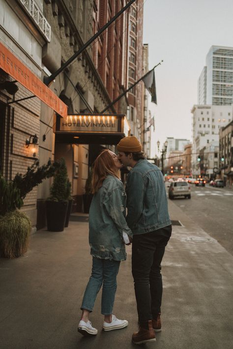 couple just got engaged in downtown Portland and were walking around enjoying the downtown views, shot in Portland Oregon by Miranda Harper photo Downtown Riverside Photoshoot, Portland Oregon Engagement Photos, Engagement Photos Town Square, Downtown Austin Photoshoot, Small Downtown Photoshoot, Couples Photos Downtown, Downtown Couple Photoshoot Summer, Engagement Photos Urban Setting, Engagement Photos Poses City