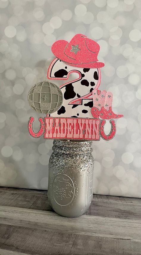 Pink Cowgirl Party Toddler, Space Cowgirl Centerpiece, Pink Disco Cowgirl Party Decorations, Disco Cowgirl Cake Topper, Hot Pink Cow Print Birthday Party, Cowgirl Birthday Cake Ideas, My First Rodeo Birthday Girl Centerpieces, Pink Rodeo Cake, Disco Cowgirl 2nd Birthday Party