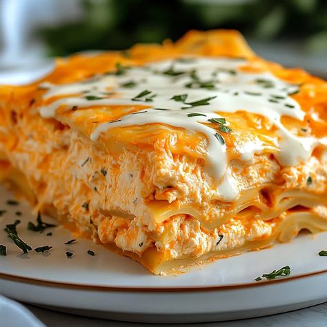 Cheesy Buffalo Chicken Lasagna with Ranch Drizzle Buffalo Chicken Dip Lasagna, Buffalo Chicken Lasagna With Ranch Drizzle, International Pasta Recipes, Buffalo Chicken Alfredo Penne, Buffalo Chicken Lasagna Recipe, Cheesy Buffalo Chicken Lasagna With Ranch Drizzle, Dash Recipes Dinner, Cheesy Buffalo Chicken Lasagna, Buffalo Lasagna