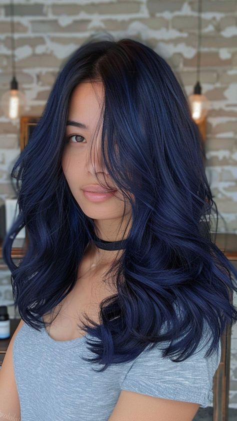 24 Blue Black Hairstyles for Every Occasion Indigo Blue Hair Color, Very Dark Blue Hair, Blueblack Haircolor, Blue On Brown Hair, Asian Blue Hair, Deep Blue Hair Color, Balayage Blue Hair, Dark Midnight Blue Hair, Dark Blue Balayage