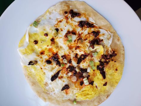 Fried Egg Tortilla, Tortilla Egg Breakfast, Egg Tortilla, Wonton Chips, Egg Skillet, Chili Crisp, Tortilla Shells, Fried Tortillas, Spinach Egg