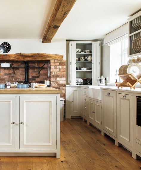 The materials are the star of the show in this 19th-century farmhouse | Classic Cabinets, Large Console Table, Snug Room, Century Farmhouse, Brick Chimney, Cottage Interiors, Comfy Sofa, Kitchen Design Decor, New Property