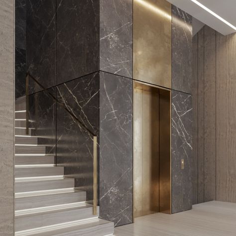 Double height areas are always given the luxury look of any space especially when some luxury material is introduced to the walls or the floor, some gold inserts have enriched the design since the lobby is a welcoming area always.#interiordesignideas
#architecture
#architecturephotograpy
#interiorarchitecture Modern Elevator Design, Beige Wall Black Trim, Lift Cladding Design, Marble Cladding On Wall Exterior, Hallway Designs Modern, Lift Wall Cladding Design, Residential Building Entrance, Lift Wall, Lift Lobby Design