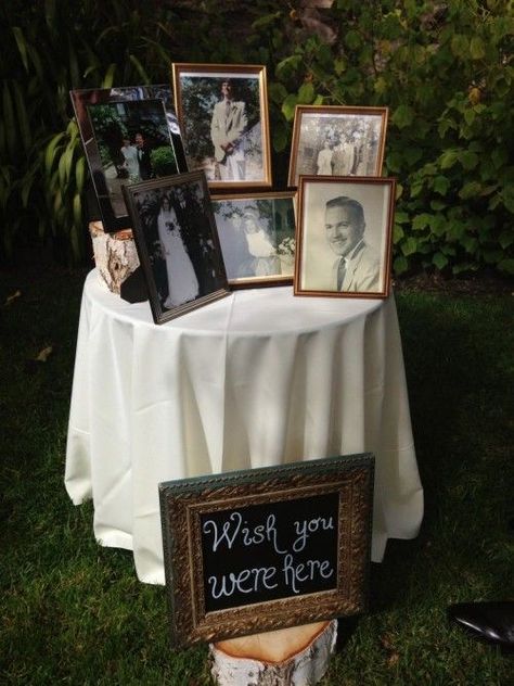 Touching Ways To Remember Lost Loved Ones At Your Wedding-- Still trying to decide how I will honor those I have lost at my wedding. Can't decide which of these ideas to go with. Romantic Backyard, Wedding Photo Display, Rustic Wedding Decorations, Backyard Weddings, Boda Diy, Peacock Wedding, Future Wedding Plans, Cute Wedding Ideas, Wedding Cake Designs