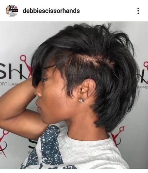 Black Bustier Over White Shirt, Mohawk Bob For Black Women, Mohawk Pixie Cut For Black Women, Short Mohawk Hairstyles For Black Women, Kelly Cut Hairstyle Black Women, Mullet Hairstyle Black Women, Long Pixie Haircut For Black Women, Black Hair Mullet, Mohawk Hairstyles For Black Women