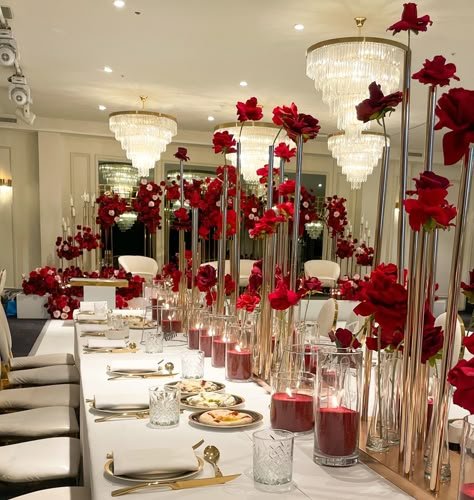 We designed a stunning and romantic table setting with floral and candle decor, creating a beautiful and luxe tablescape. Styling, decor, flowers and set up by @museweddingsandevents Candles by @rosewood.candles Venue @thehighlinevenue Red Round Table Decorations, Red Gold Wedding Decorations, Red Round Table, Red Tablescape, Round Table Wedding, Round Table Decorations, Galentines Brunch, Mendhi Decor, Tablescape Design