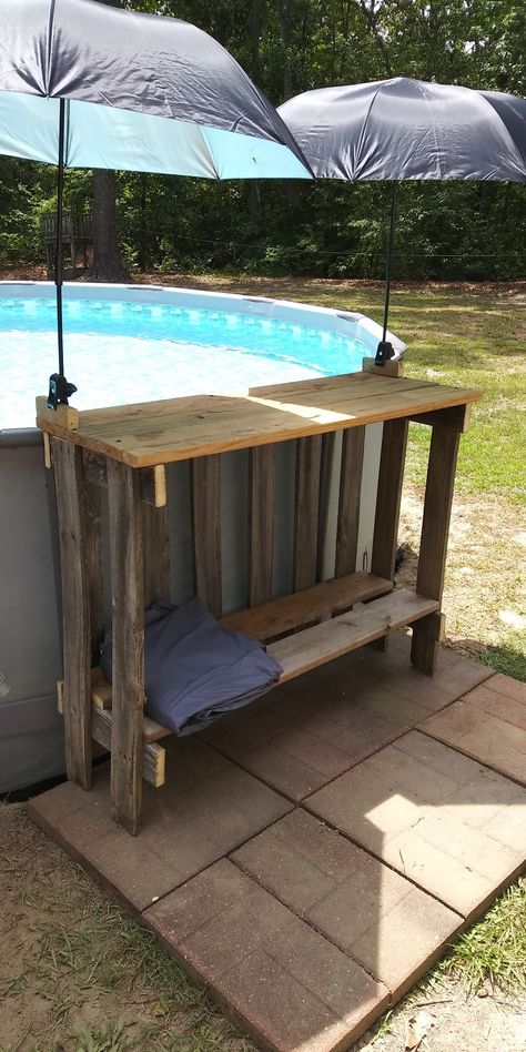 Pool Box Ideas, Diy Hot Tub Towel Rack Outdoor, Above Ground Pool Shelf Diy, Above Ground Pool Lounge Area, Pallet Pool Bar Diy Projects, Pool Shelf Ideas Above Ground, Diy Poolside Table, Pool Diy Ideas Decor, Above Ground Pool Table Diy