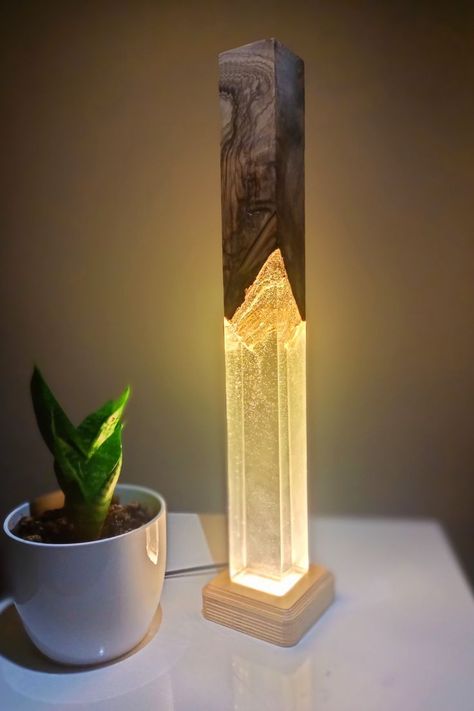 Unique olive wood and Epoxy Resing lamp from Turkey. 💎 Why Beauty is Important? 💎 Over the last decades more and more studies have found that surroundings that are actually aesthetically pleasing to us can improve our well-being, our behaviour, cognitive function and mood Epoxy Resin Desk, Diy Resin Lamp, Resin Desk, Wooden Lamps Design, Wood Lamp Design, Resin And Wood Diy, Wood Resin Table, Ankara Turkey, Wood Table Design