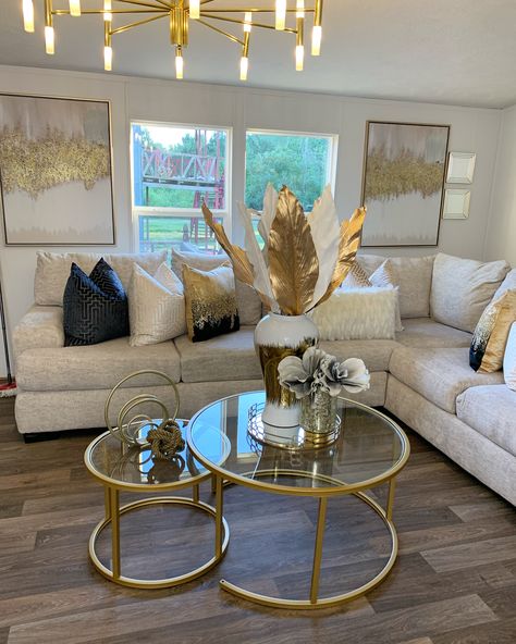 Grey Gold And Brown Living Room, Brown Gold White Living Room, Gray Couch Gold Accents, Dark Beige Couch Living Room Ideas, Living Room Decor With Beige Couch, Brown And Gold Living Room Ideas, Tan And Gold Living Room, Cream And Gold Living Room Ideas, Marble And Gold Living Room