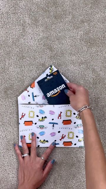 LENNIA (Folding Queen 👑) on Instagram: "How to gift wrap a gift card #giftwrappinghacks #giftideas #xmas" How To Wrap A Gift Card With Wrapping Paper, How To Wrap A Paper Gift Certificate, How To Wrap A Gift Card For Christmas, How To Wrap Gift Cards For Christmas, Wrapping Gift Cards Creative, How To Wrap Gift Cards, Wrapping A Gift Card, How To Wrap A Gift Card, Gift Card Wrapping Ideas