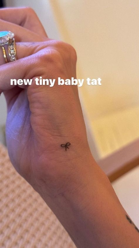 Hailey Bieber Bow Tattoo, Tiny Ribbon Tattoo, Mini Hand Tattoos For Women, Small Ribbon Tattoo, Mini Bow Tattoo, Dainty Forearm Tattoo Women, Dainty Forearm Tattoo, Mini Hand Tattoos, Hailey Bieber Hand Tattoo